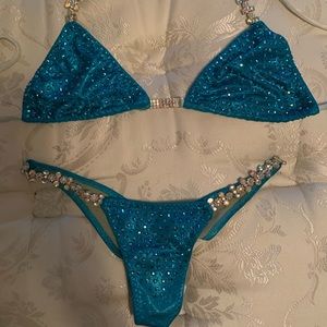 Beautiful blue tint bodybuilding bikini. Has been worn.